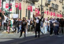 Chocan estudiantes y policías tras marcha en Morelia; una joven resultó herida